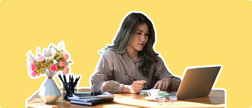 Lawyer at her desk taking notes on law content writing tips and tricks