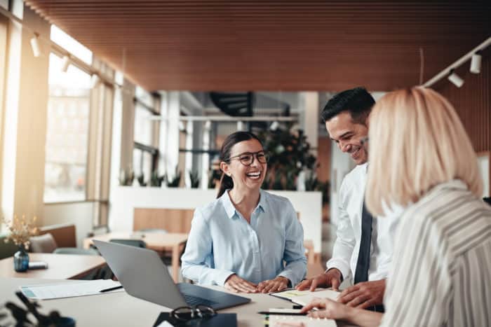 Three legal content writers collaborating on their client's legal website content