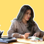 Lawyer at her desk taking notes on law content writing tips and tricks